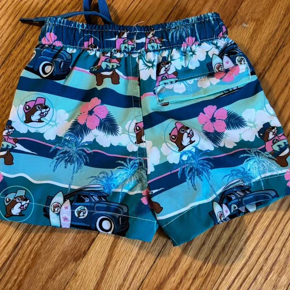 Buc-ee's Toddler 6-9 M Swim Trunks Hawaiian Palm Trees Surfing Floral Teal Green